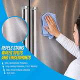 Hand wiping a stainless steel fridge coated with BLITZ Ceramic Coating, which repels stains, water spots and fingerprints