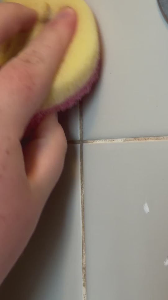 Clearing mold stains from tile grout with BLITZ gel